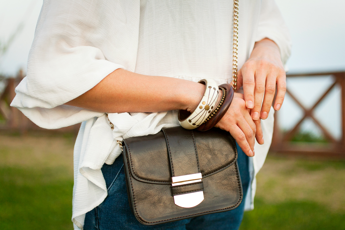 woman with a crossbody purse