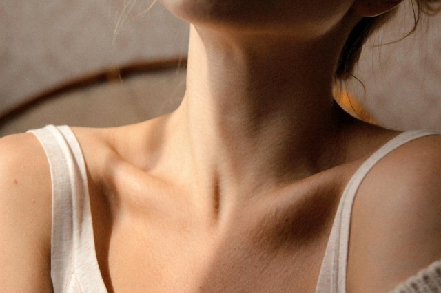 woman in white tank top