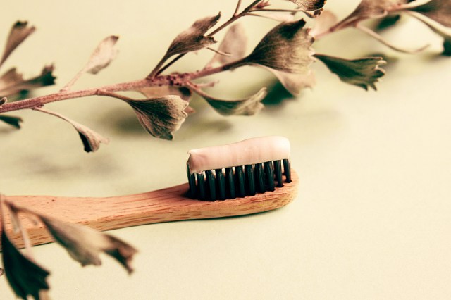 pink and brown brush on white surface