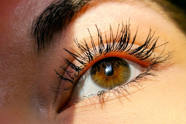 Close-up of woman's eye with long, black eye lashes