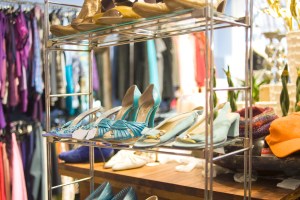 High heels on a shoe rack in a thrift store