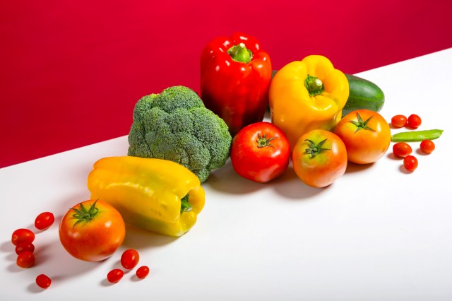 a pile of different types of vegetables on a table