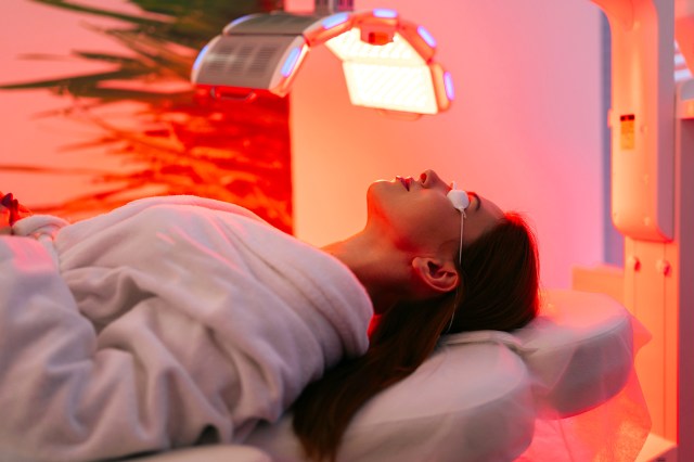 Woman doing red light therapy treatment