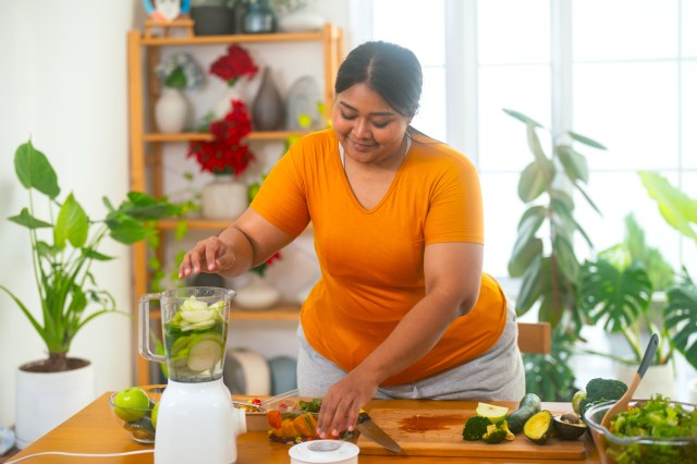 Woman making healthy smoothie